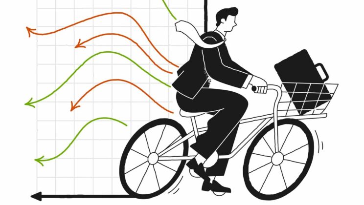 Modern businessman or financial trader agent in back suit riding bike. Stock market and trading graphs on background. Graphs are going up and down.